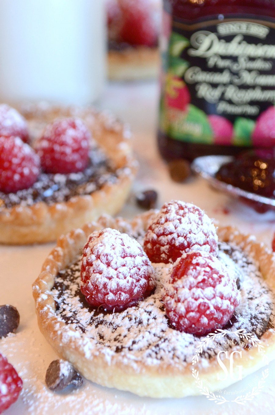 MASON-JAR-LID-CHOCOLATE-RASPBERRY-TARTS-tarts-embellished-with-confectioners-sugar-stonegableblog.com_